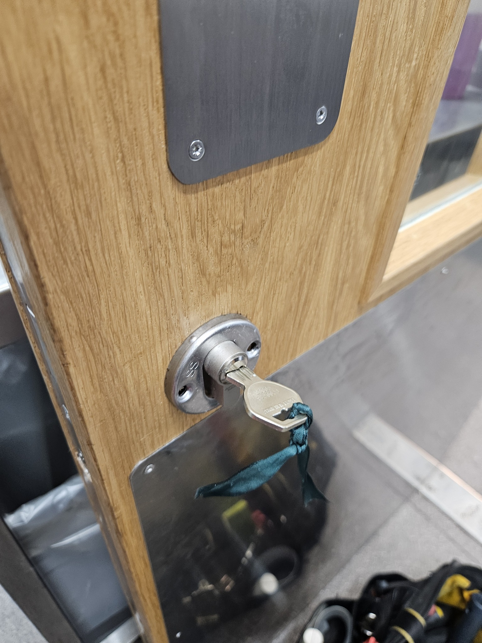 New lock installed on a door in a commercial building